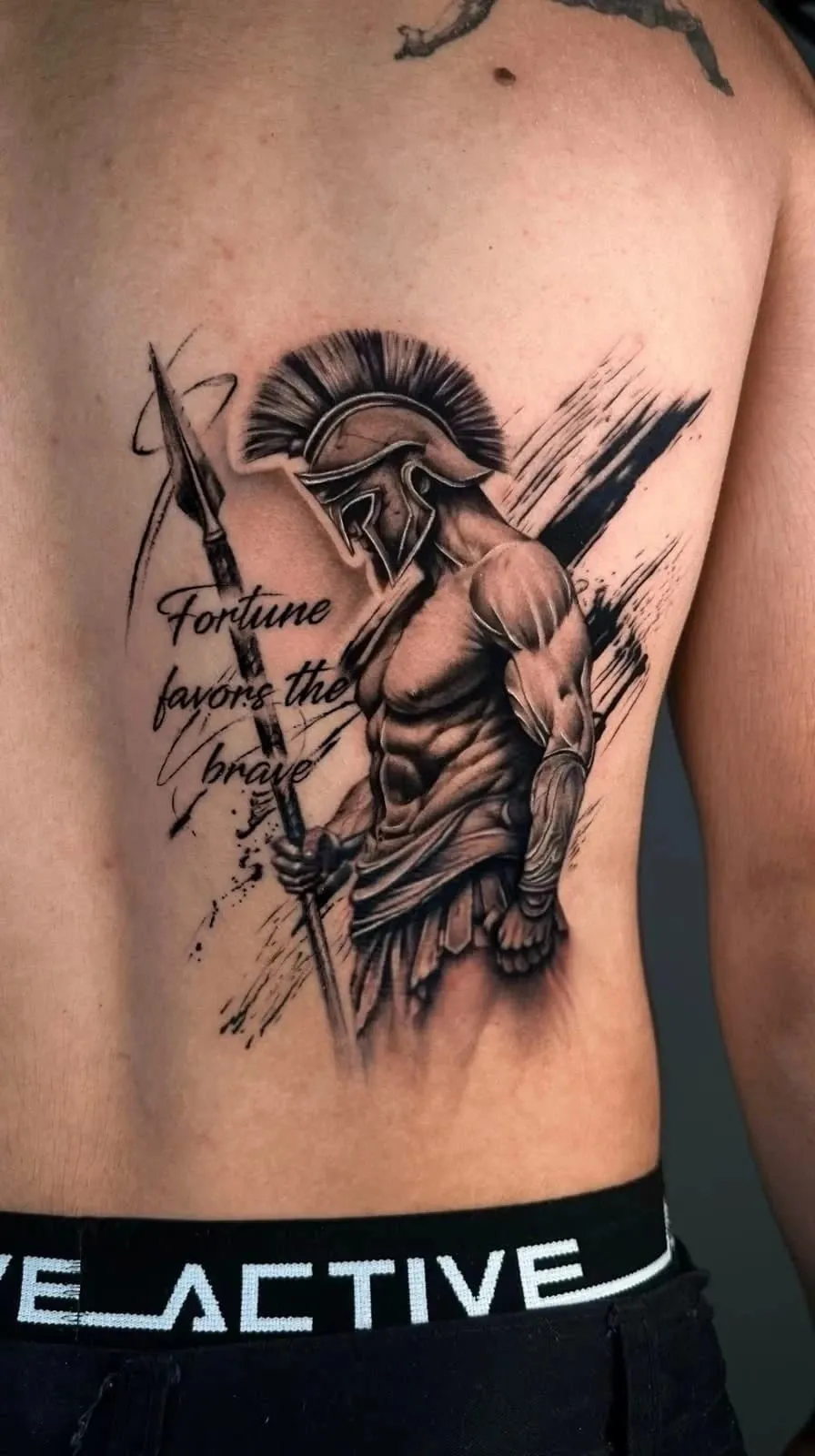 Fortune favors the brave: realism tattoo, back